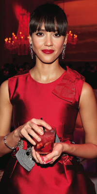 Jessica Alba wears:  Dolce & Gabbana dress and shoes, Bulgari Vintage ruby and diamond earrings and bracelet.  Photograph by:  2008 Daniele Venturelli